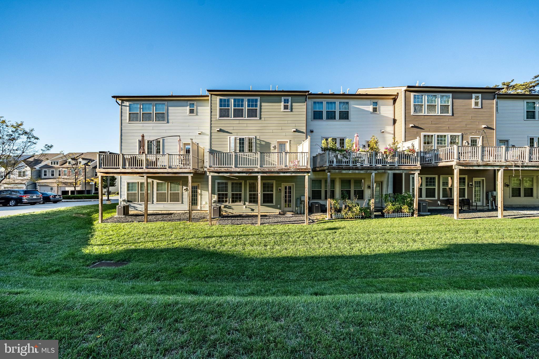 33 Addison Lane Malvern, PA 19355 - Photo 30 of 32 a front view of a house with a yard table and chairs