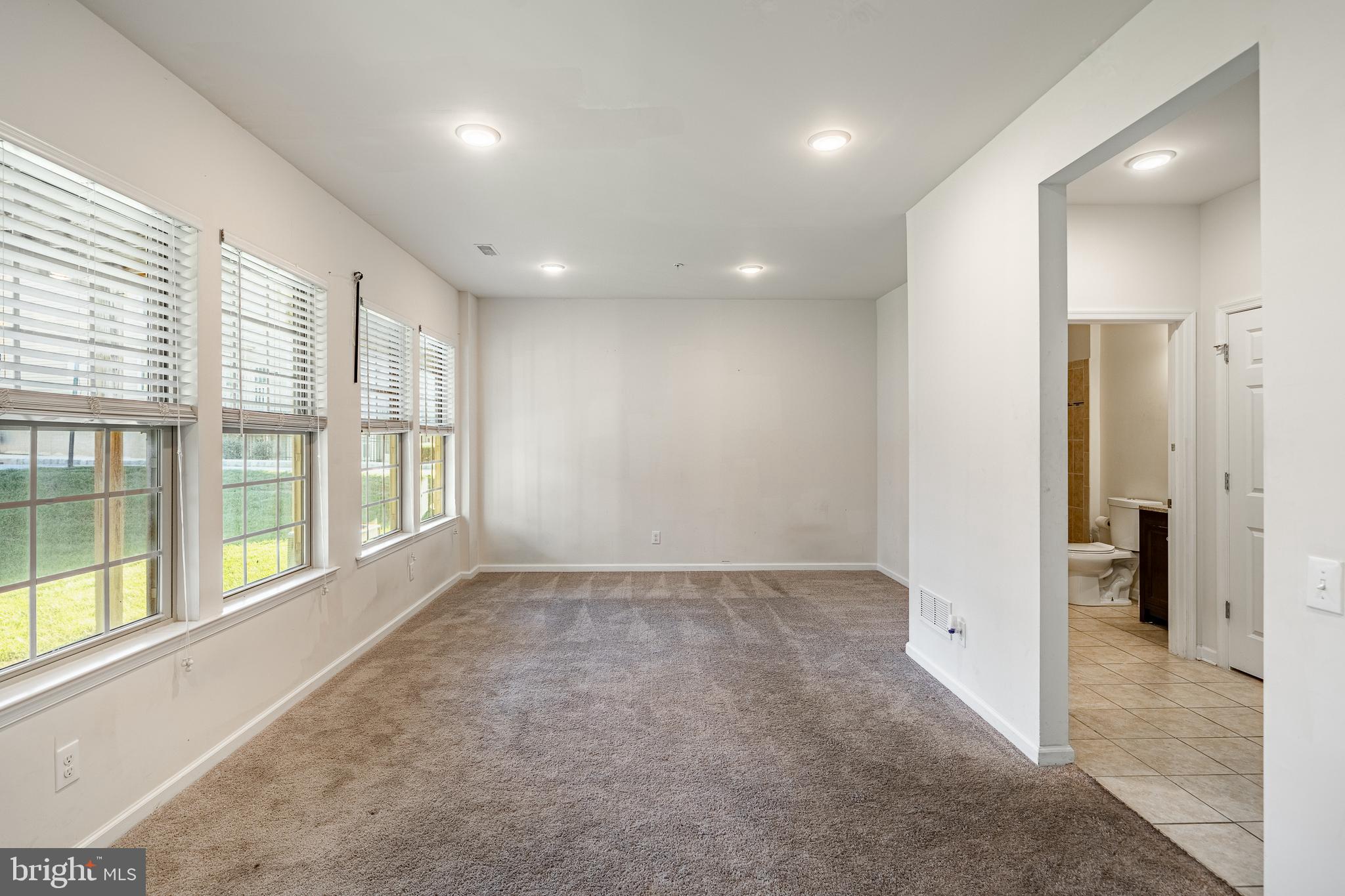 33 Addison Lane Malvern, PA 19355 - Photo 10 of 32 a view of an empty room with a window