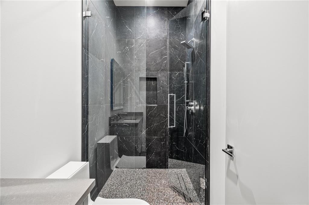 19 Spruell Springs Road Atlanta, GA 30342 - Photo 22 of 36 a bathroom with a shower