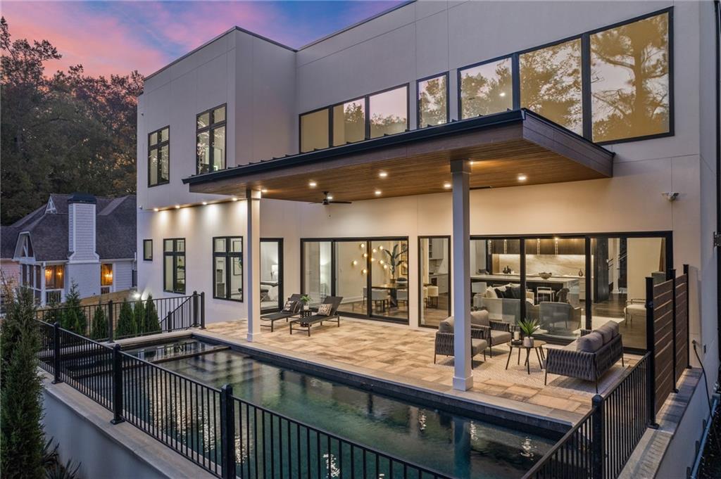 19 Spruell Springs Road Atlanta, GA 30342 - Photo 3 of 36 a view of a balcony and car parked