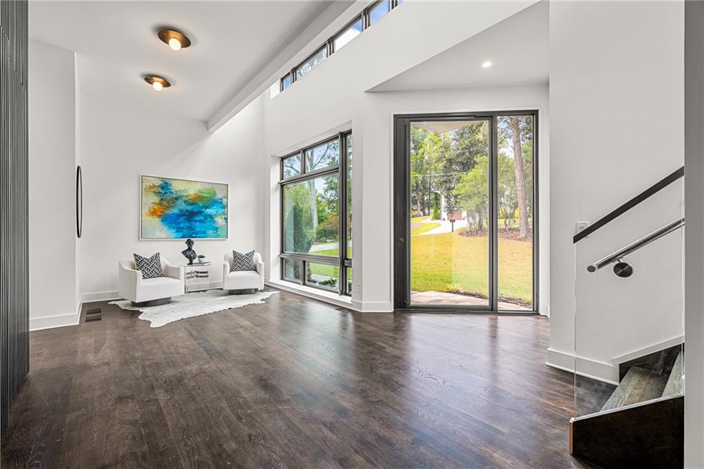 19 Spruell Springs Road Atlanta, GA 30342 - Photo 6 of 36 a living room with furniture and a large window