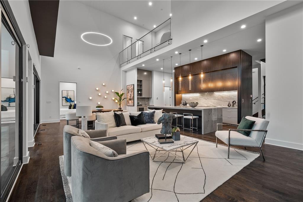 19 Spruell Springs Road Atlanta, GA 30342 - Photo 7 of 36 a living room with fireplace furniture and a flat screen tv