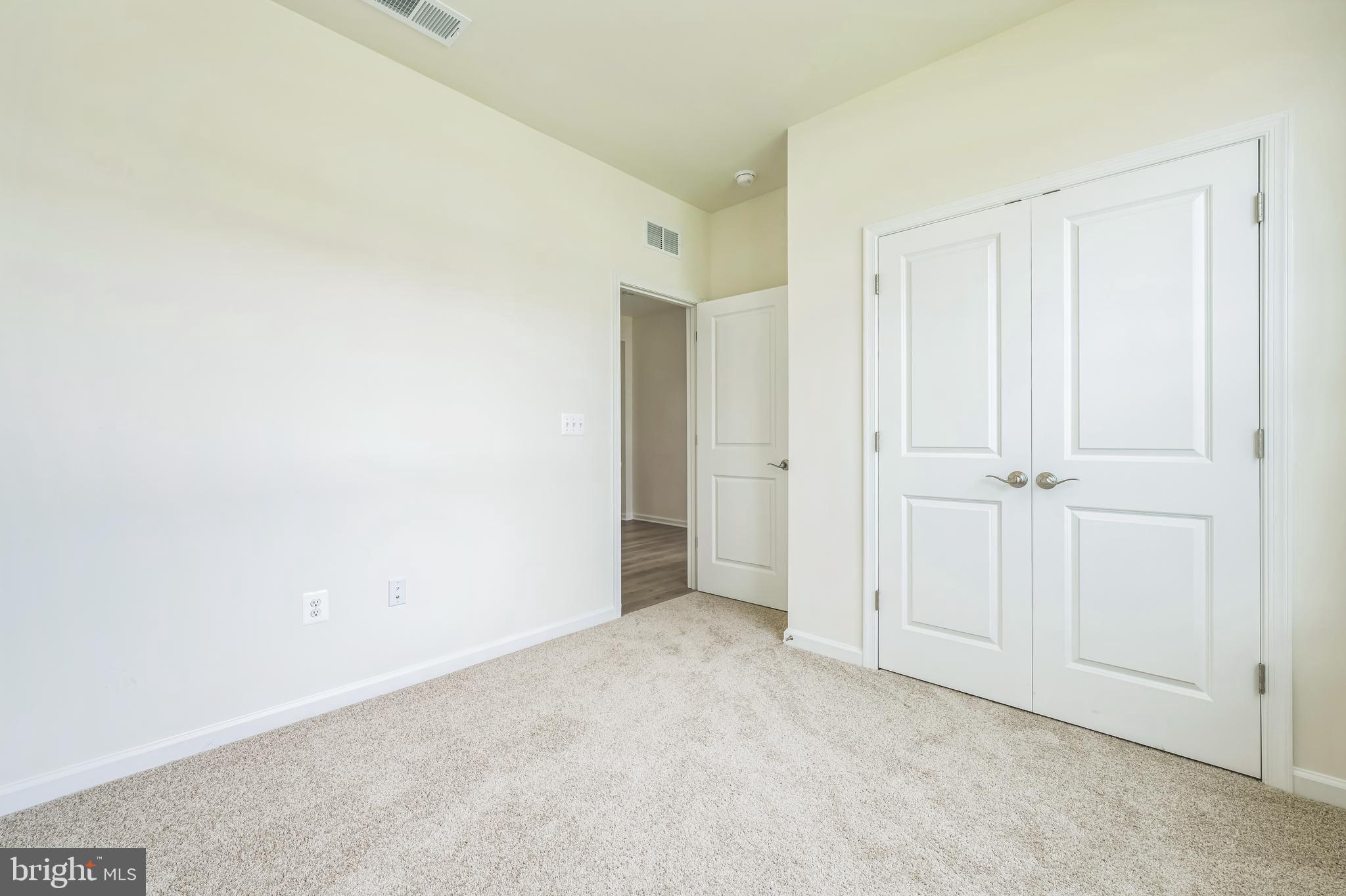 24755 Michael Isler Avenue Millsboro, DE 19966 - Photo 11 of 14 a view of an empty room