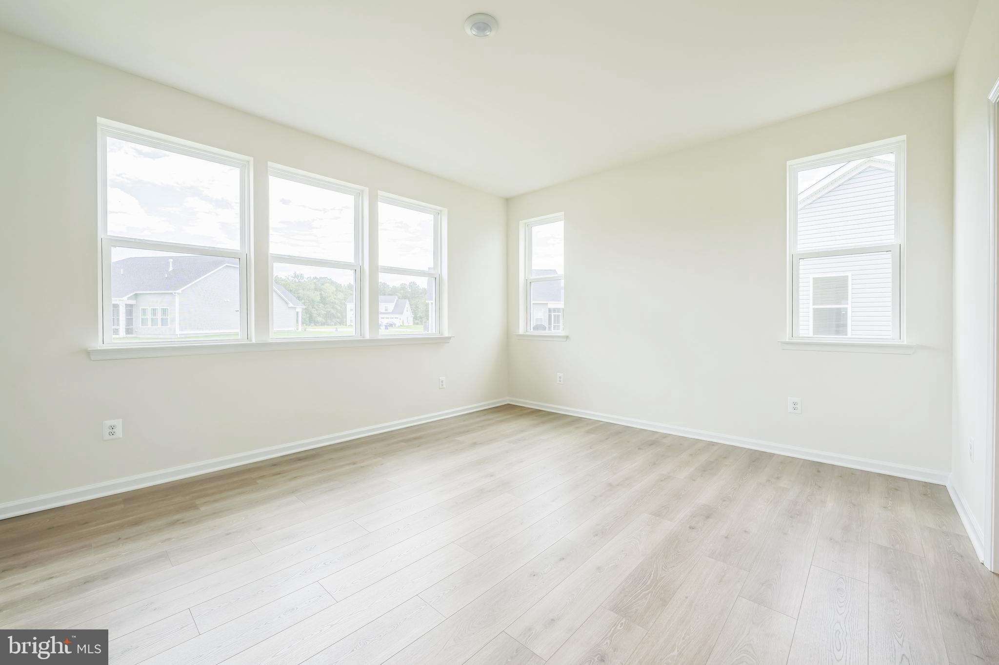 24755 Michael Isler Avenue Millsboro, DE 19966 - Photo 12 of 14 an empty room with a window