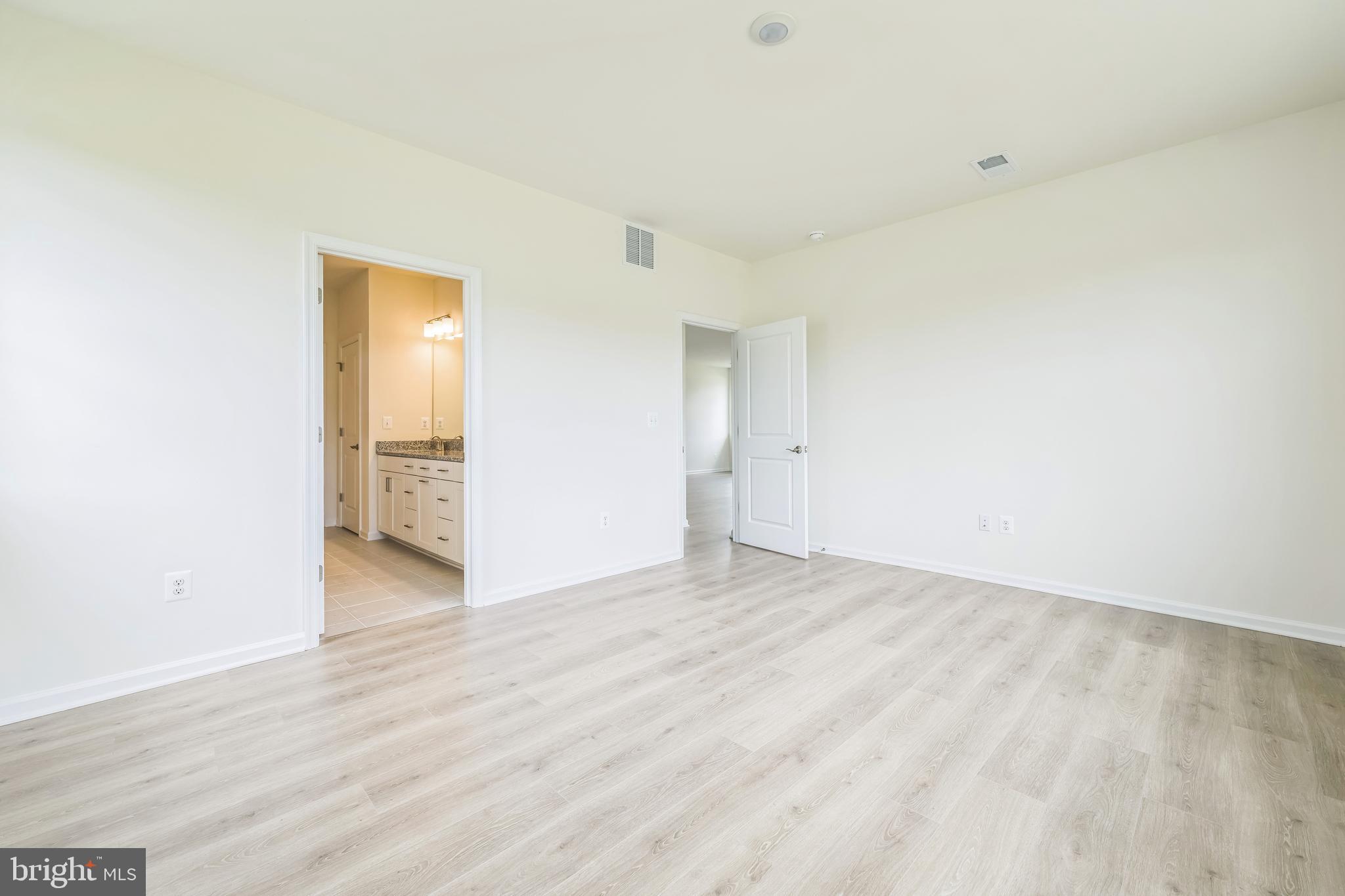 24755 Michael Isler Avenue Millsboro, DE 19966 - Photo 13 of 14 a view of an empty room