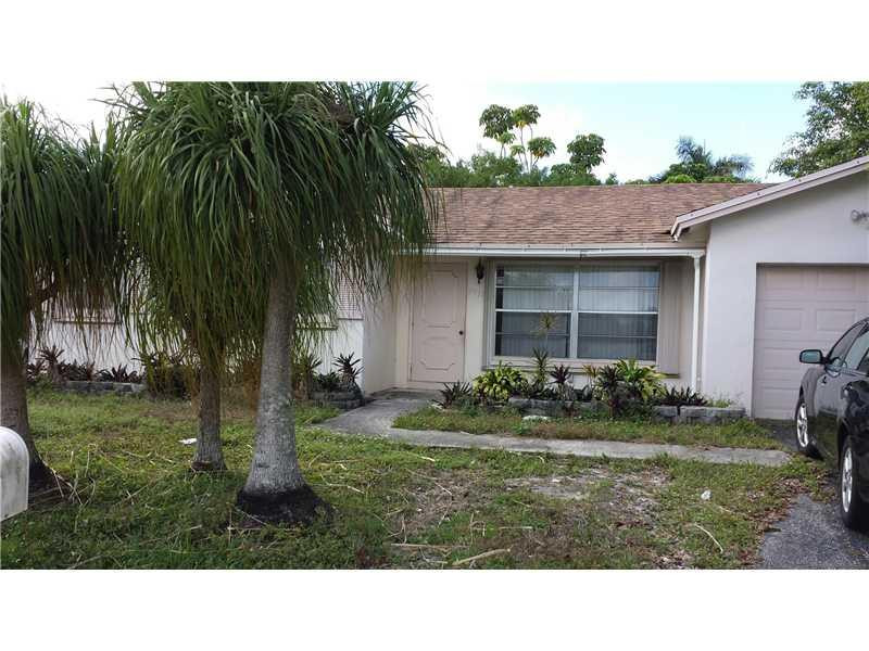 9771 Southwest 3rd Place Boca Raton, FL 33428 - Photo 2 of 3 Exterior Front