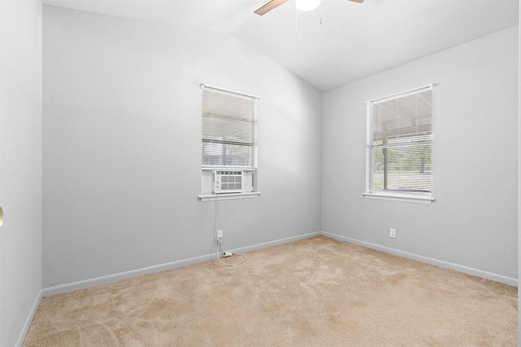 235 Country Drive Waco, TX 76705 - Photo 11 of 29 an empty room with windows