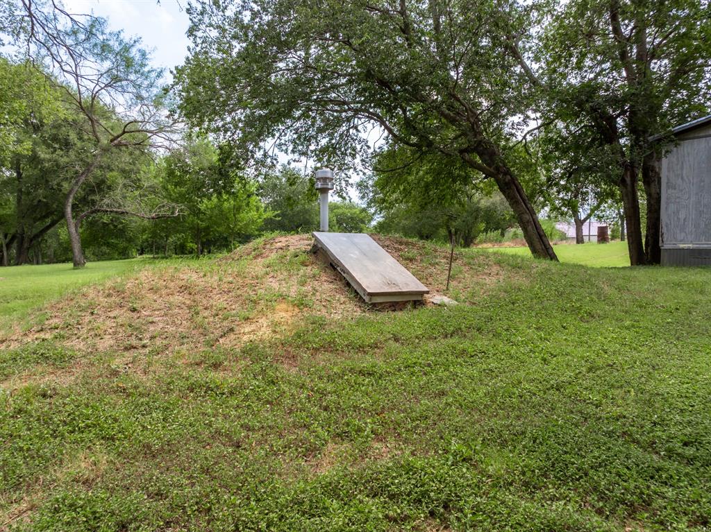 235 Country Drive Waco, TX 76705 - Photo 19 of 29 a view of a yard with a tree