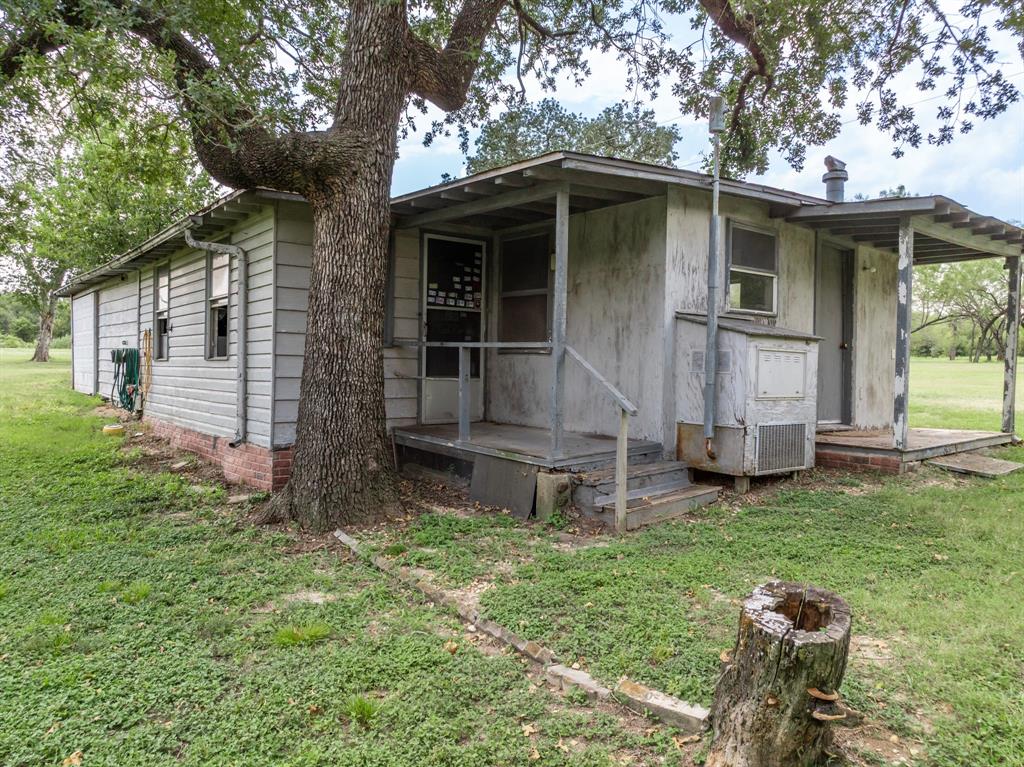 235 Country Drive Waco, TX 76705 - Photo 22 of 29 a view of a house with backyard