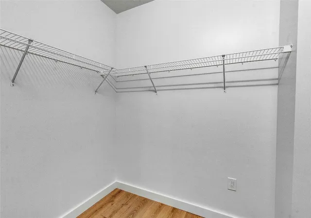 a view of a room with racks on the wall