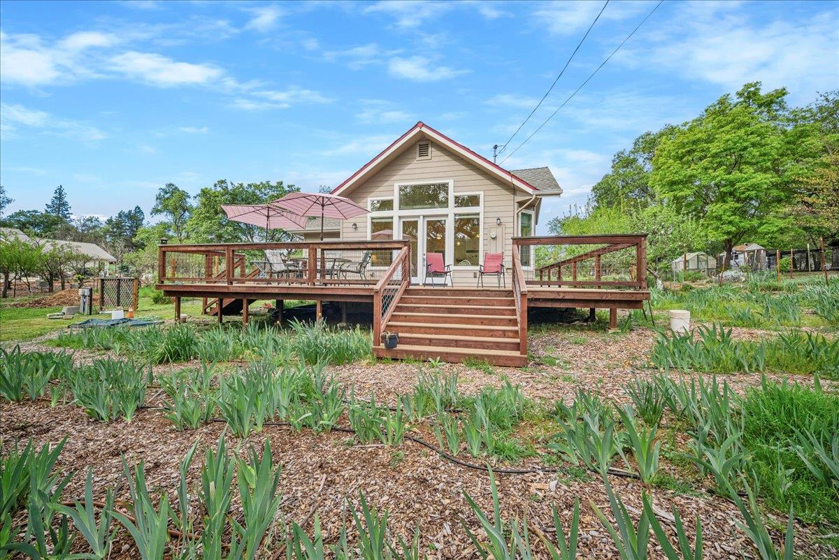 709 Cole Road Meadow Vista, CA 95722 - Photo 20 of 57 a front view of a house with a yard