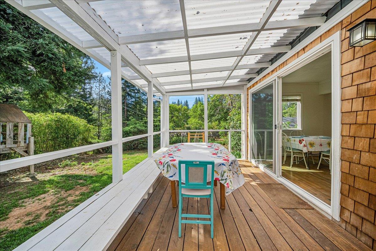 709 Cole Road Meadow Vista, CA 95722 - Photo 48 of 57 a view of a balcony with wooden floor and outdoor space