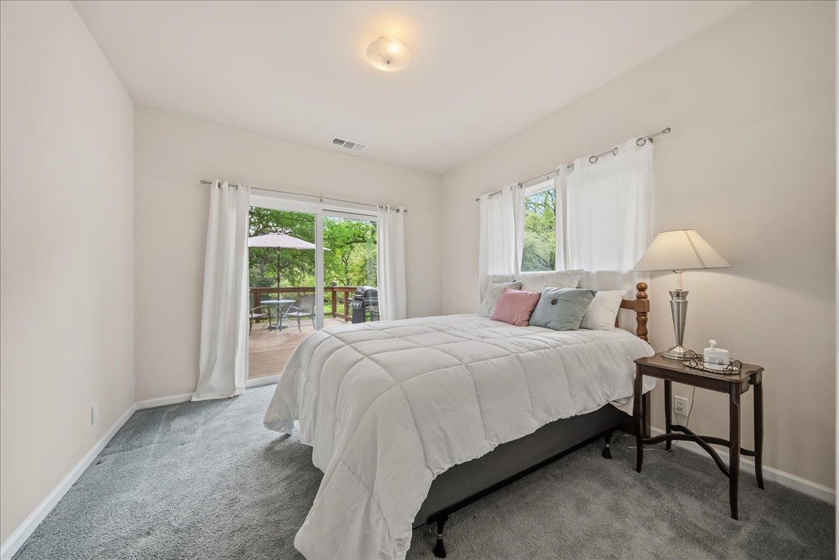 709 Cole Road Meadow Vista, CA 95722 - Photo 8 of 57 a bed room with a bed and a window