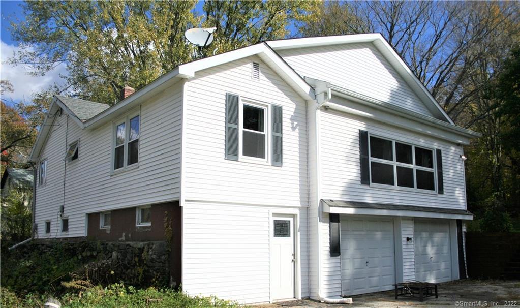 64 Card Street Lebanon, CT 06249 - Photo 1 of 1 Full walkout lower level and 2 car drive under garage