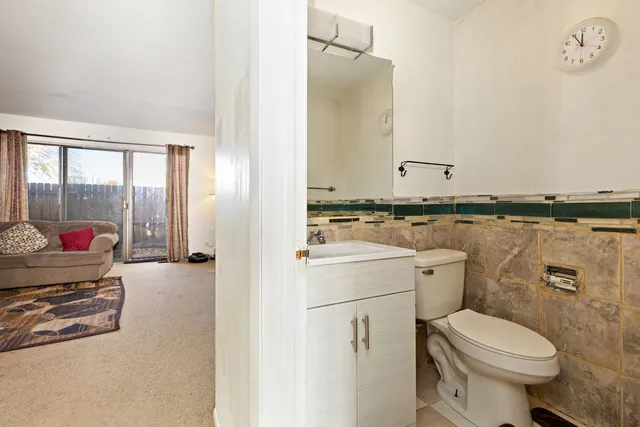 a bathroom with a toilet and a sink