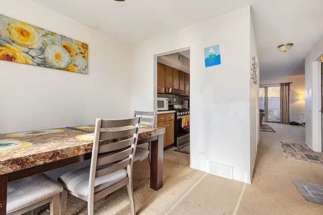 a view of a workspace with furniture