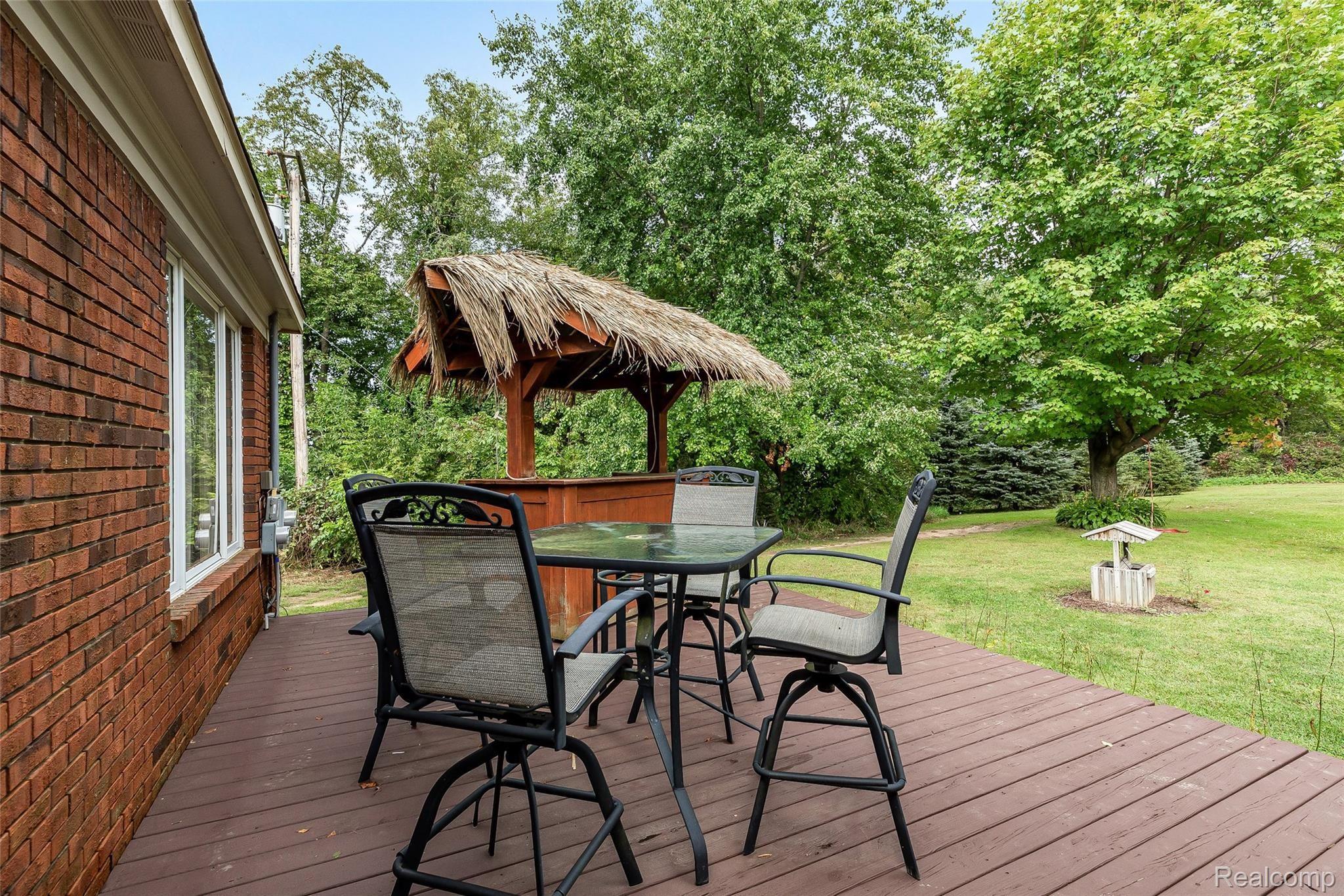 13895 Hibner Road Hartland, MI 48353 - Photo 10 of 43 Large deck for entertaining