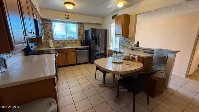 a kitchen with a sink cabinets and counter space