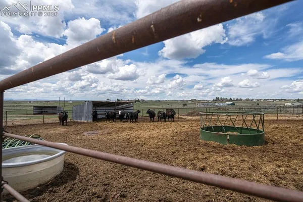 a view of a lake with a terrace