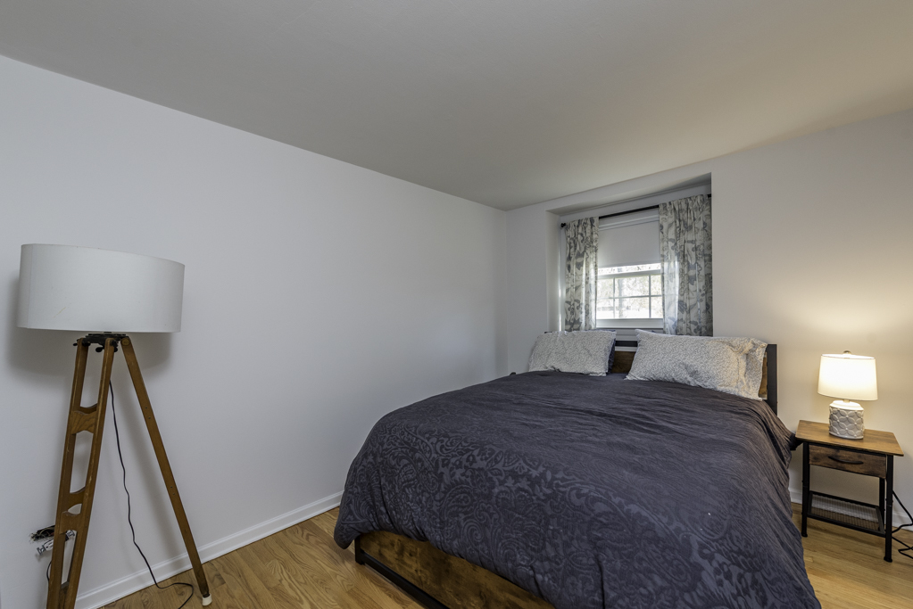 419 Northgate Road Lindenhurst, IL 60046 - Photo 15 of 23 a bedroom with a bed and a window