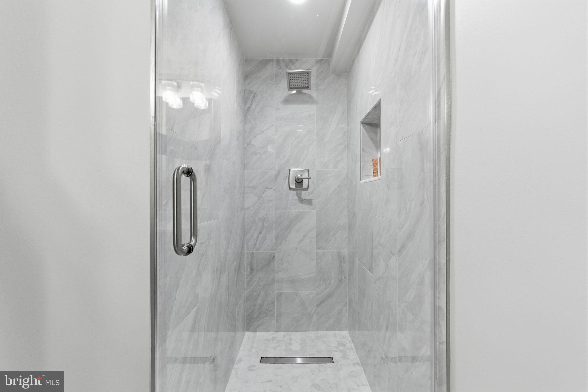 1319 East Capitol Street Southeast Washington, DC 20003 - Photo 38 of 46 a bathroom with a shower