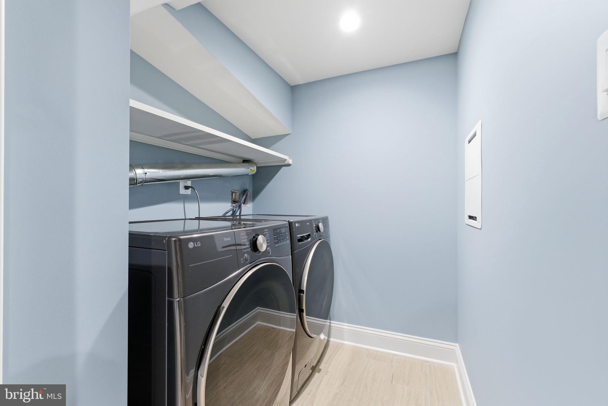 1319 East Capitol Street Southeast Washington, DC 20003 - Photo 39 of 46 a utility room with dryer and washer