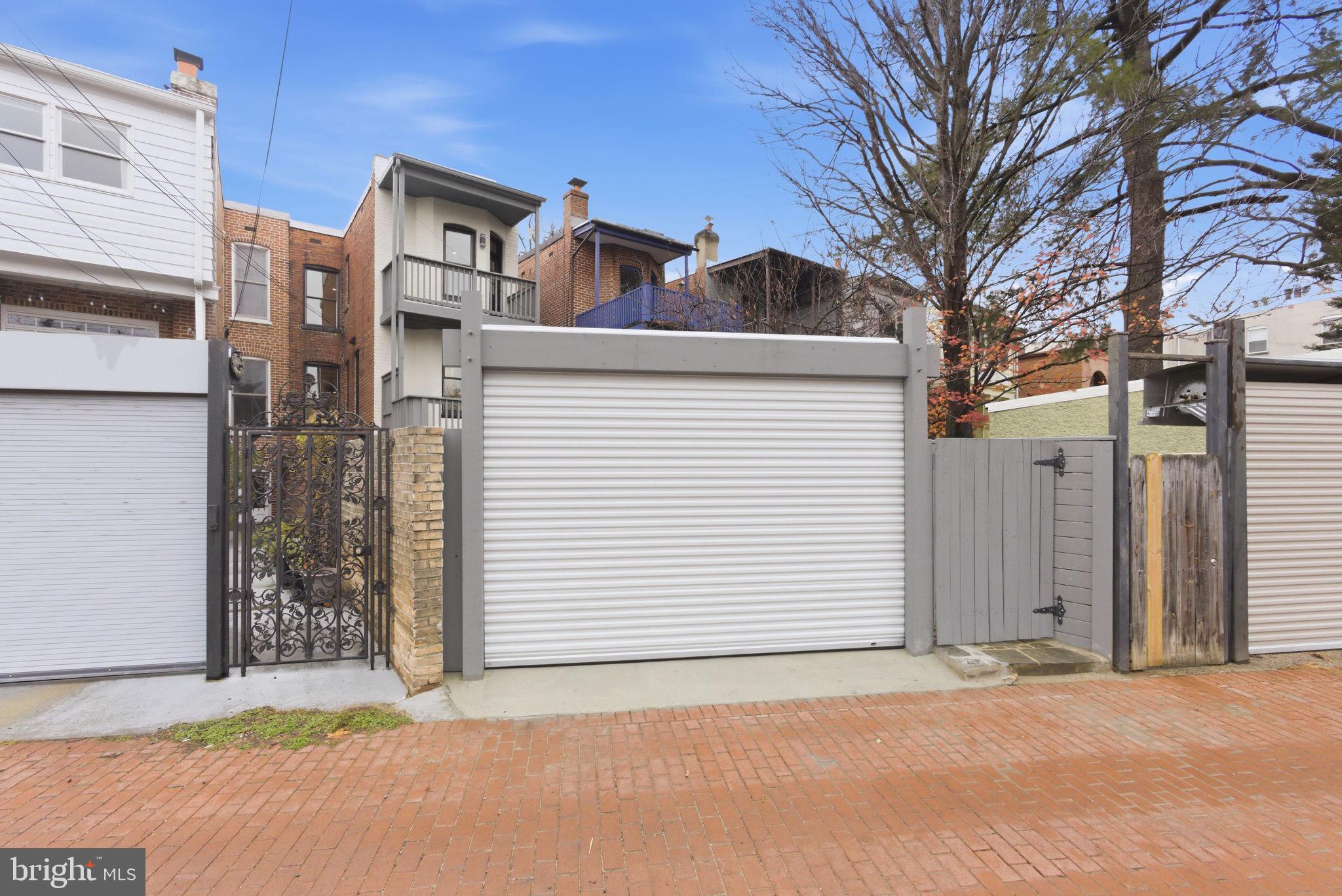 1319 East Capitol Street Southeast Washington, DC 20003 - Photo 45 of 46 a house that has a tree in front of it
