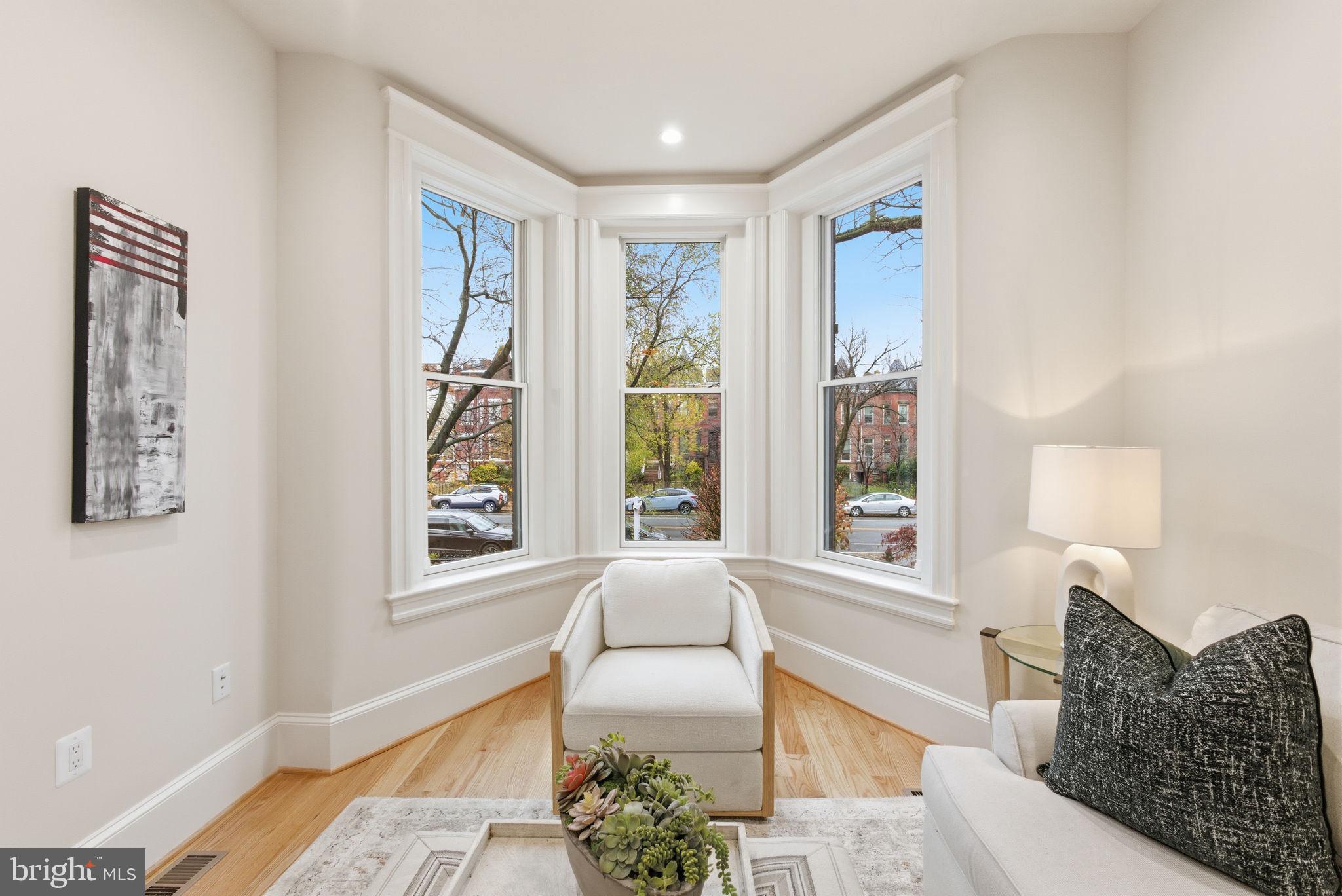 1319 East Capitol Street Southeast Washington, DC 20003 - Photo 5 of 46 a living room with furniture and a window