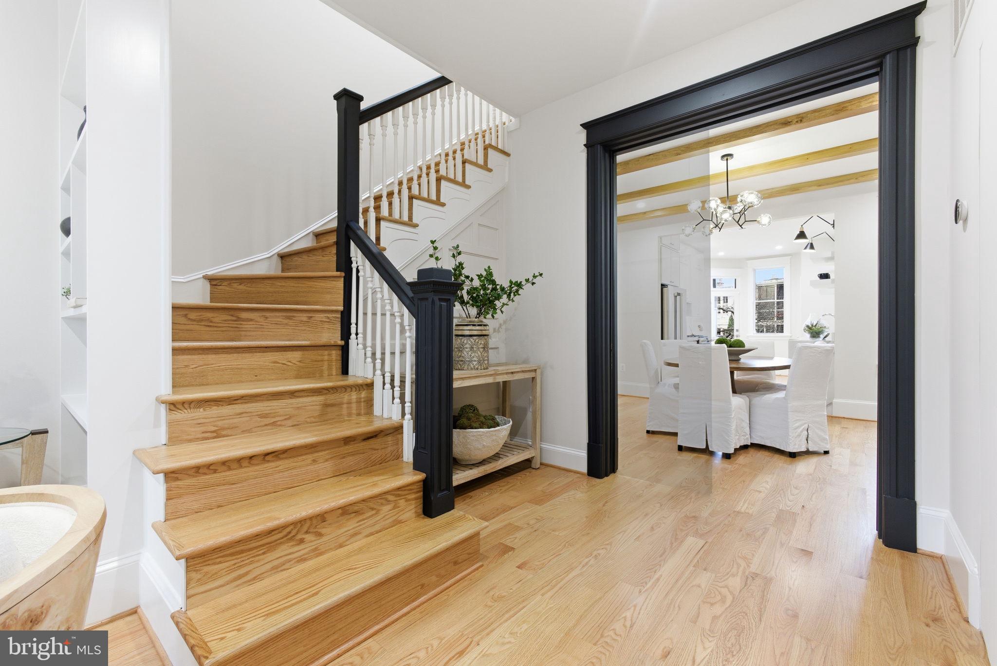 1319 East Capitol Street Southeast Washington, DC 20003 - Photo 6 of 46 a view of entryway and hall with wooden floor