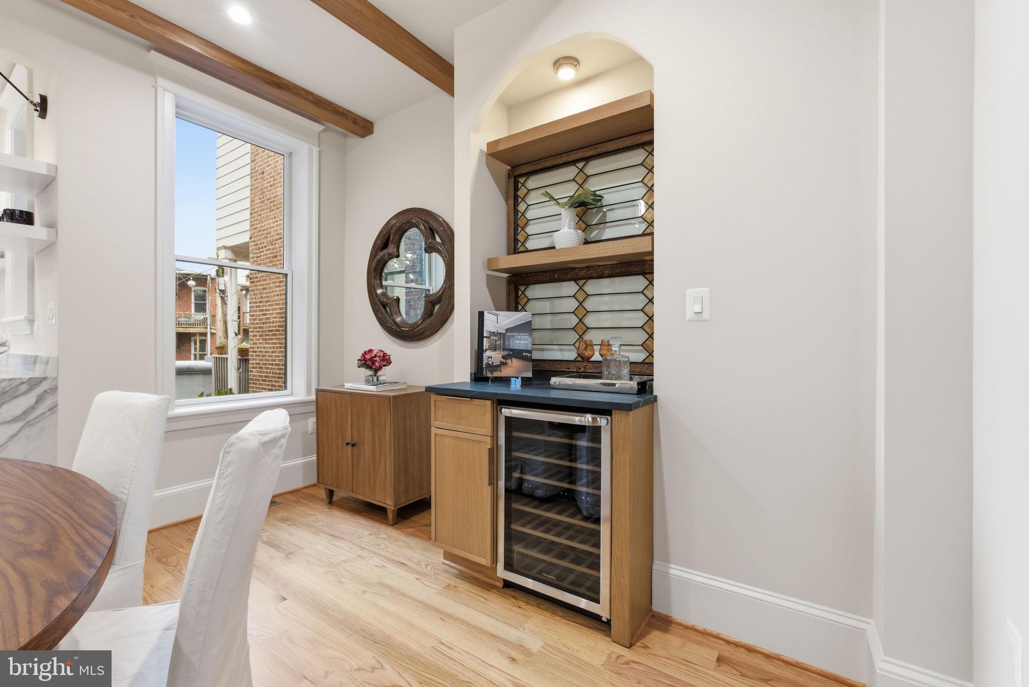 1319 East Capitol Street Southeast Washington, DC 20003 - Photo 9 of 46 a living room with furniture and a window
