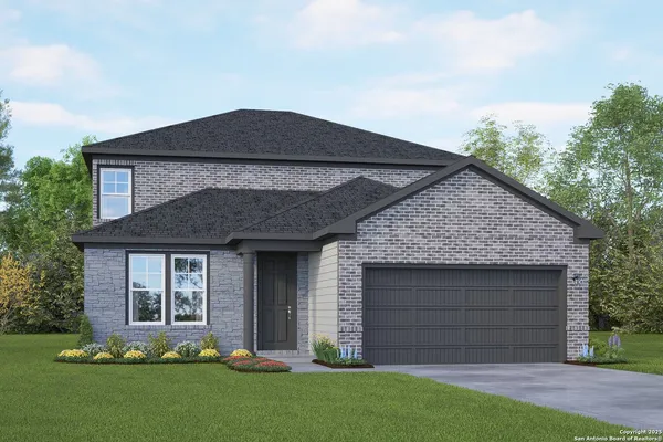 front view of a house with a yard