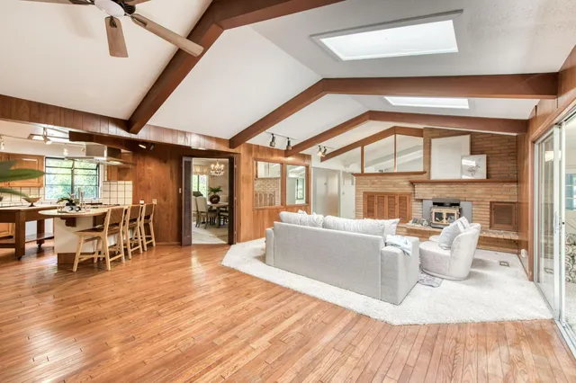a dining table with chairs and window