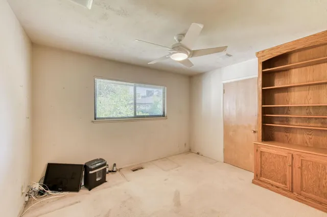a en suite bathroom with a sink a mirror and a shower