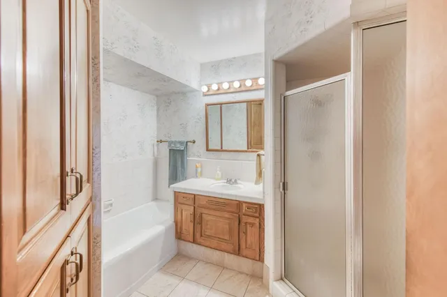 a view of an empty room with a bathroom