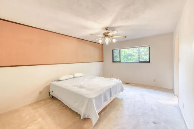 a view of a bathroom with a glass door