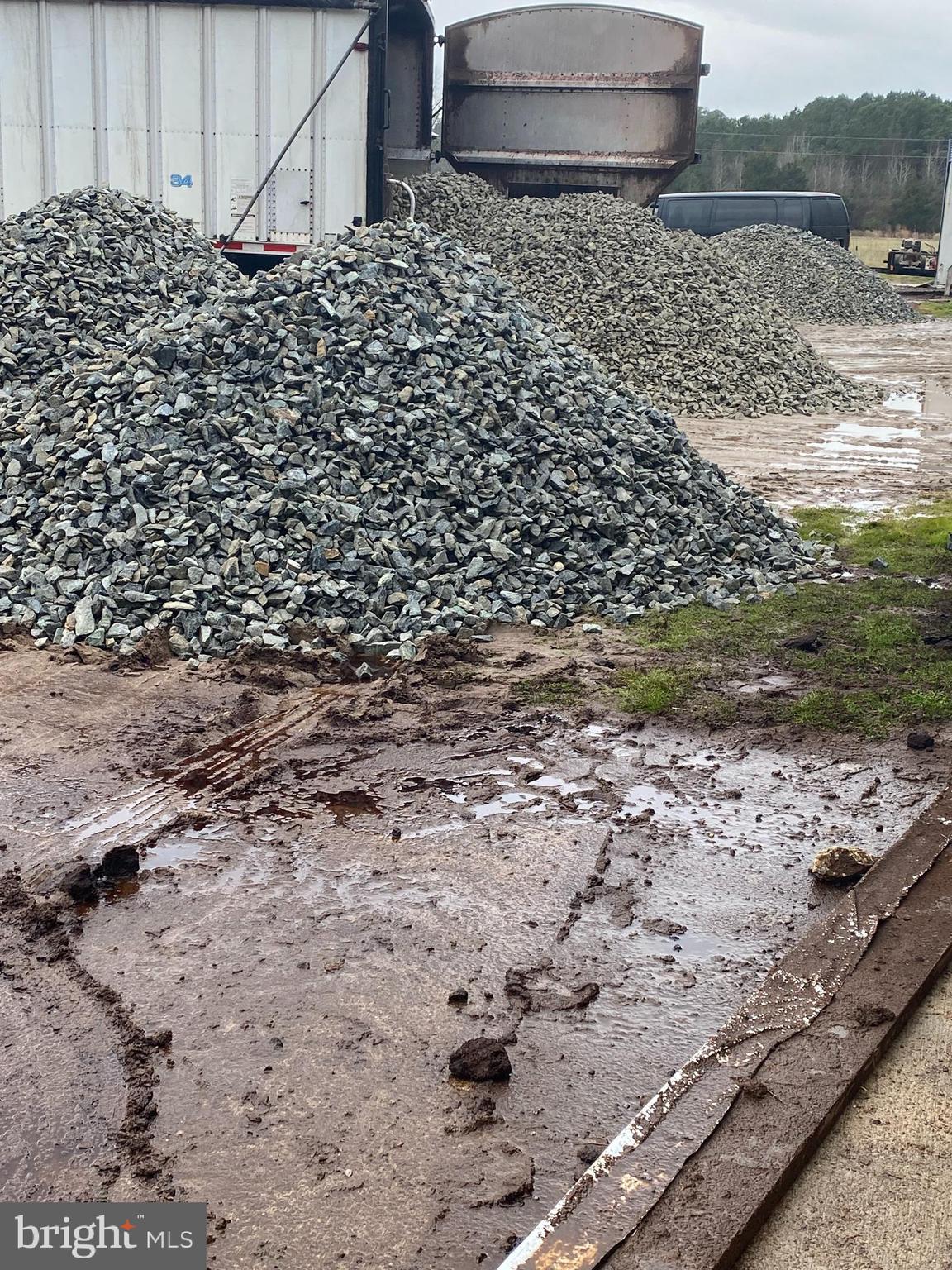27100 Cash Corner Road Crisfield, MD 21817 - Photo 48 of 57 New stone delivered will be placed in lanes