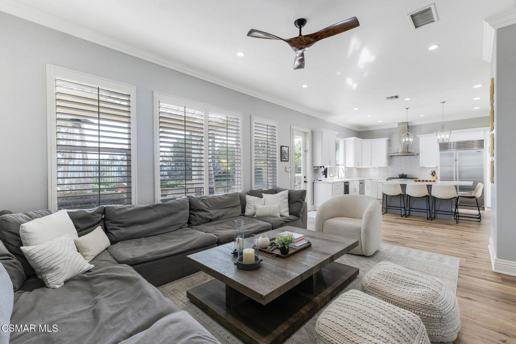 6140 Deerhill Road Oak Park, CA 91377 - Photo 14 of 72 a living room with furniture and a large window