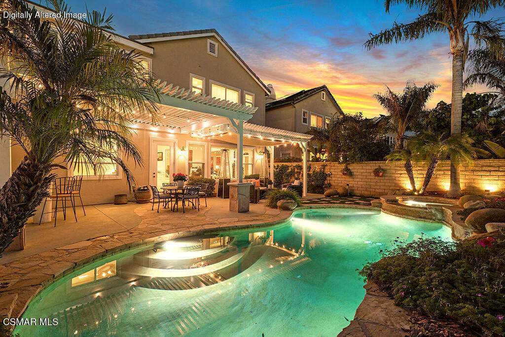 6140 Deerhill Road Oak Park, CA 91377 - Photo 2 of 72 a view of a house with a yard