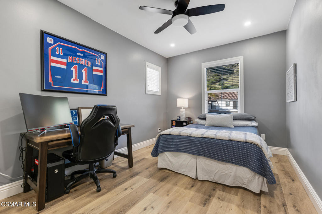 6140 Deerhill Road Oak Park, CA 91377 - Photo 44 of 72 a bedroom with a bed and a desk