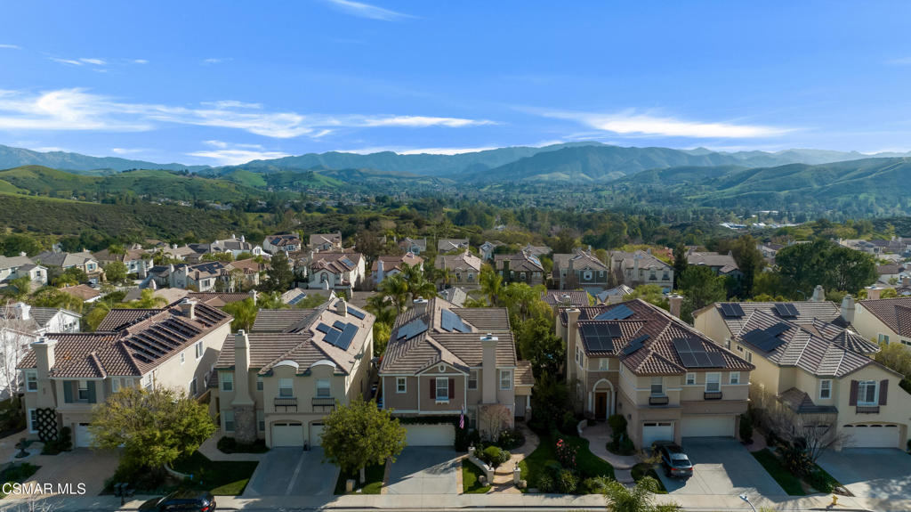 6140 Deerhill Road Oak Park, CA 91377 - Photo 50 of 72 a view of a city with mountains in the background