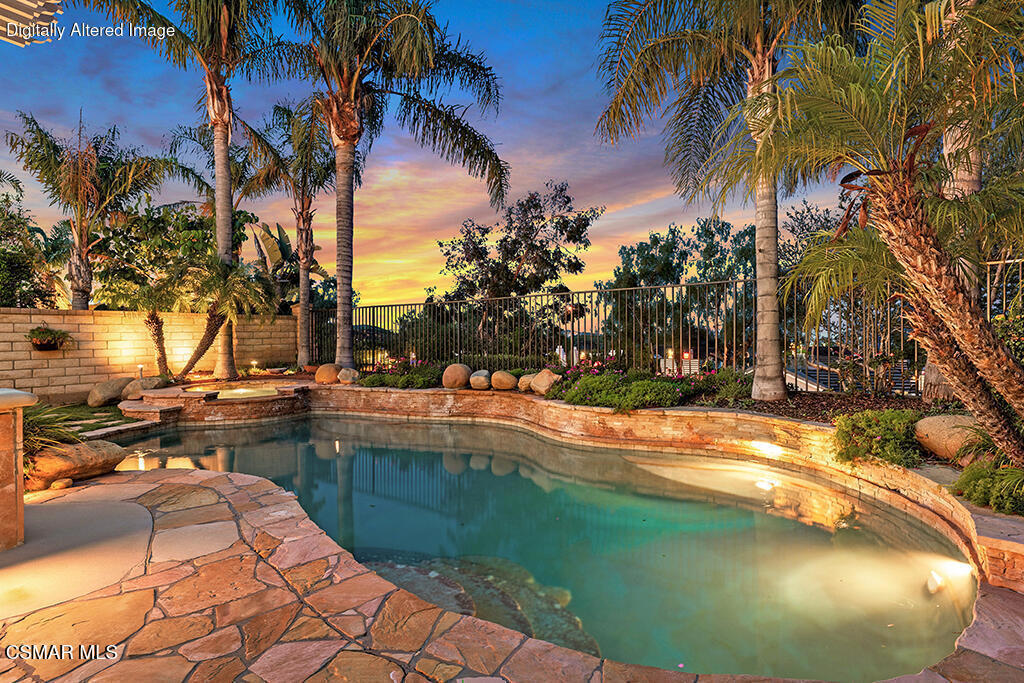 6140 Deerhill Road Oak Park, CA 91377 - Photo 56 of 72 a view of a swimming pool with a patio and a yard