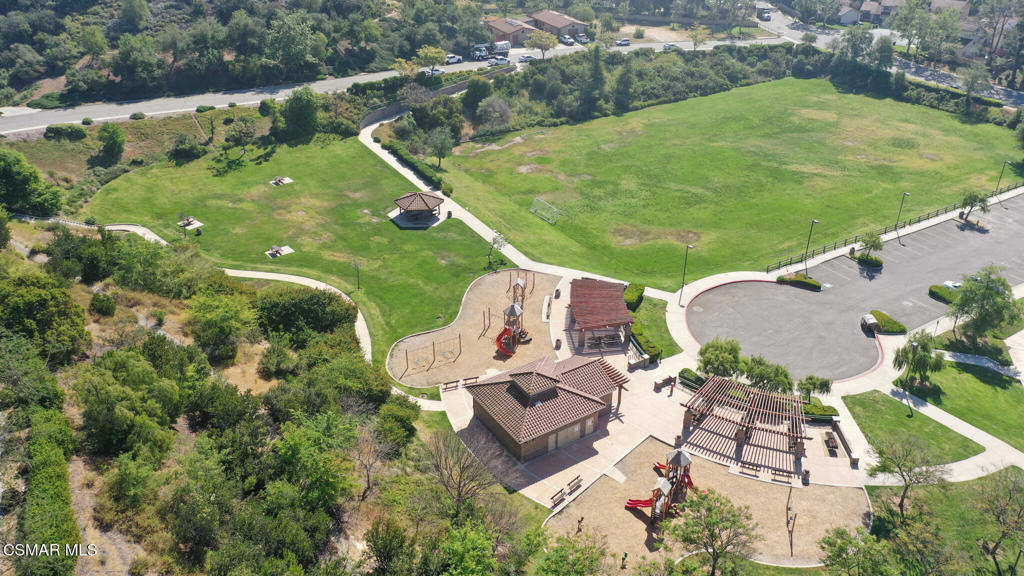 6140 Deerhill Road Oak Park, CA 91377 - Photo 63 of 72 an aerial view of residential houses with outdoor space and swimming pool
