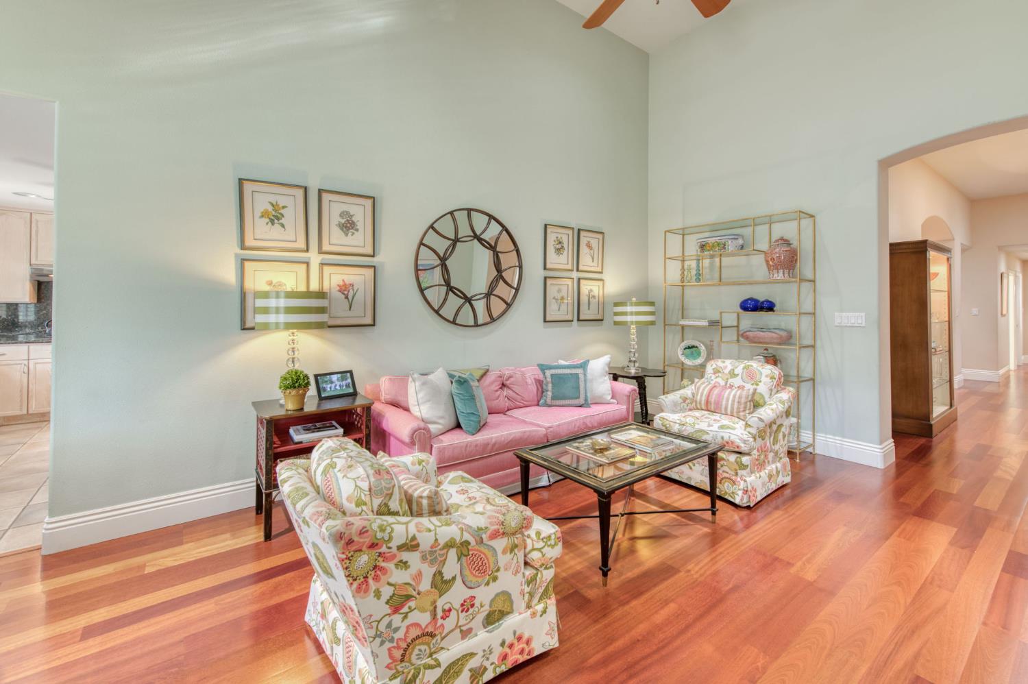 3063 West Pembrook Loop Fresno, CA 93711 - Photo 12 of 52 a living room with furniture and a wooden floor