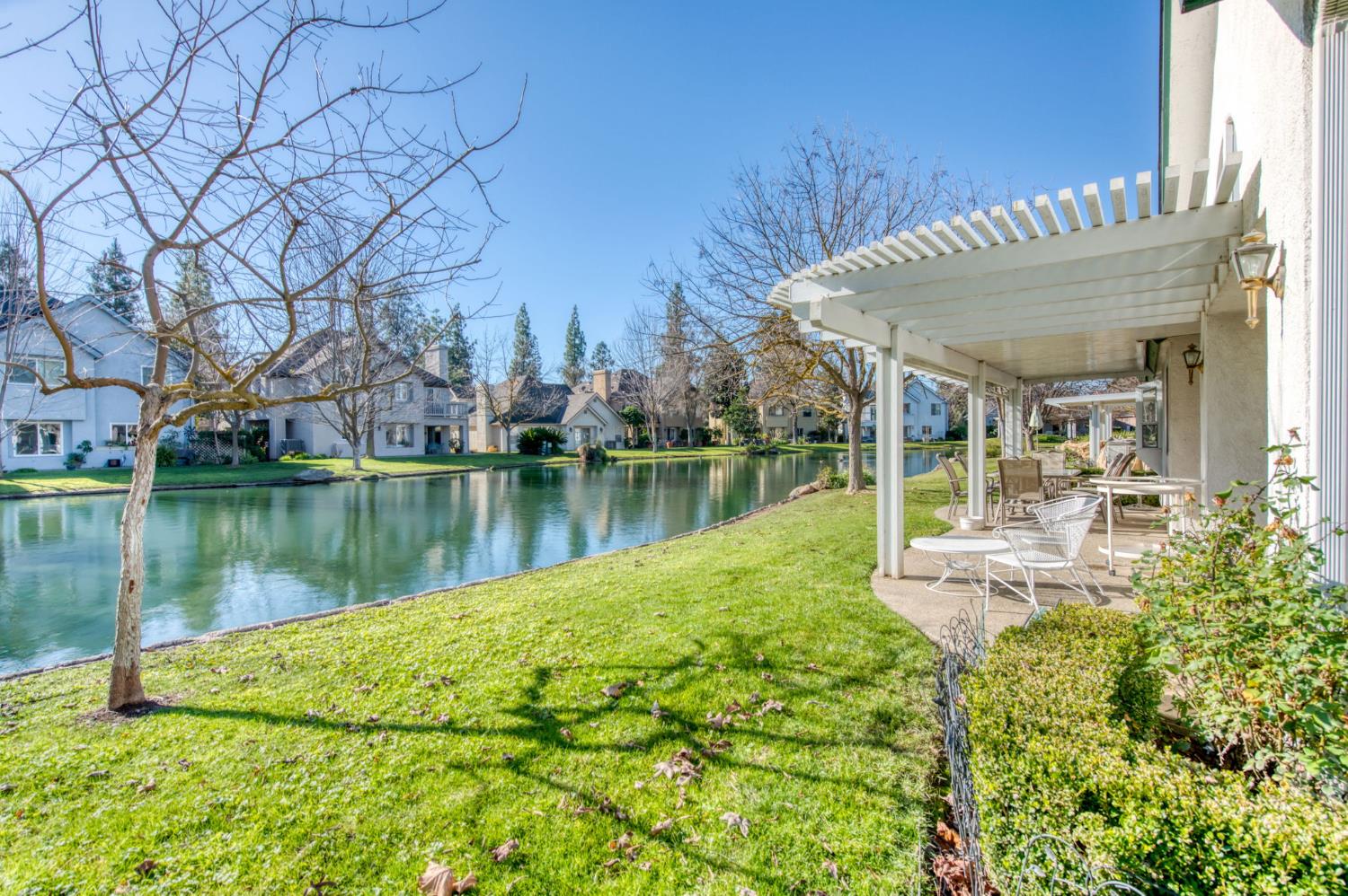 3063 West Pembrook Loop Fresno, CA 93711 - Photo 38 of 52 a view of a house with a yard and sitting area