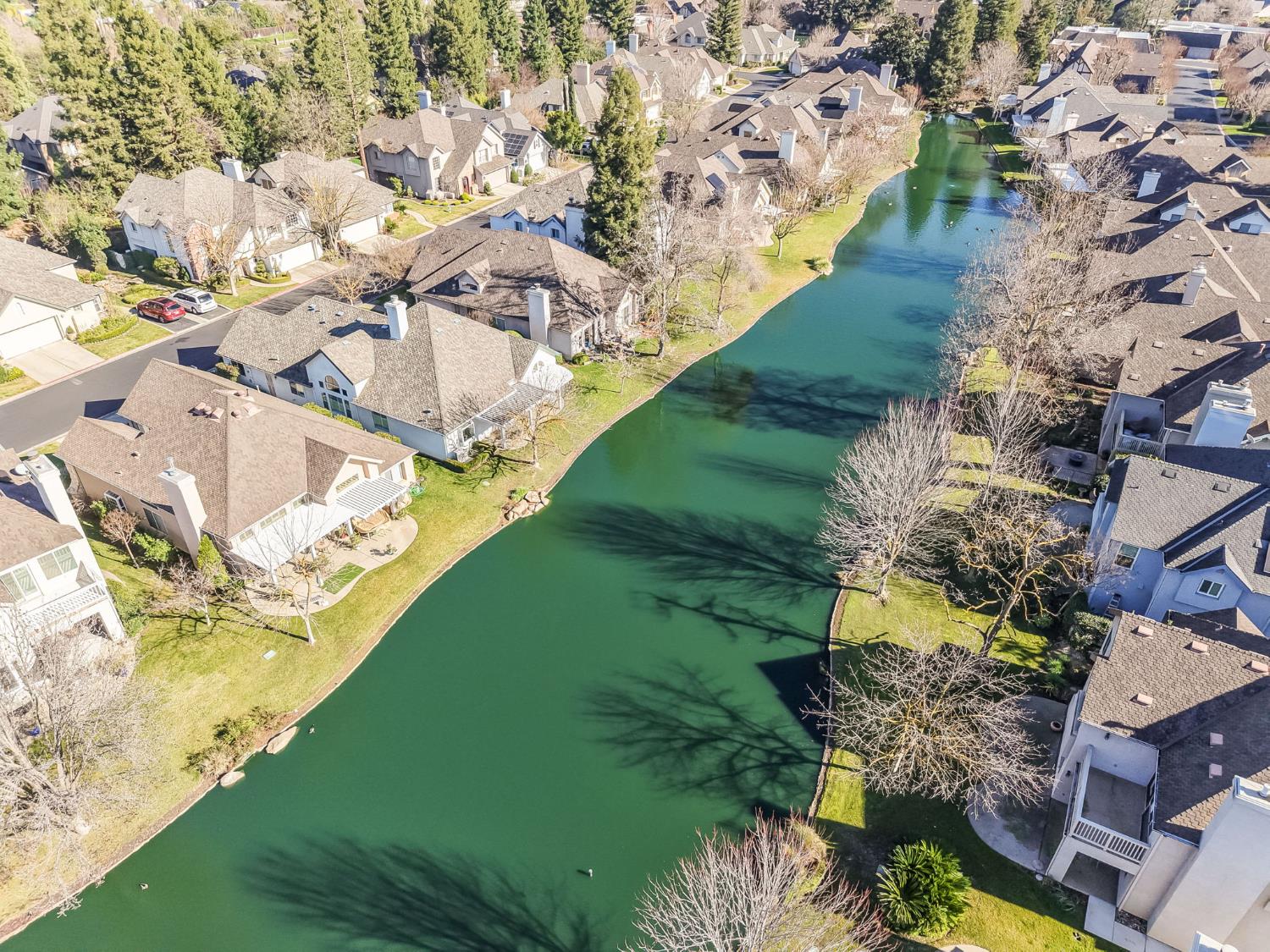3063 West Pembrook Loop Fresno, CA 93711 - Photo 43 of 52 a view of a lake with a yard