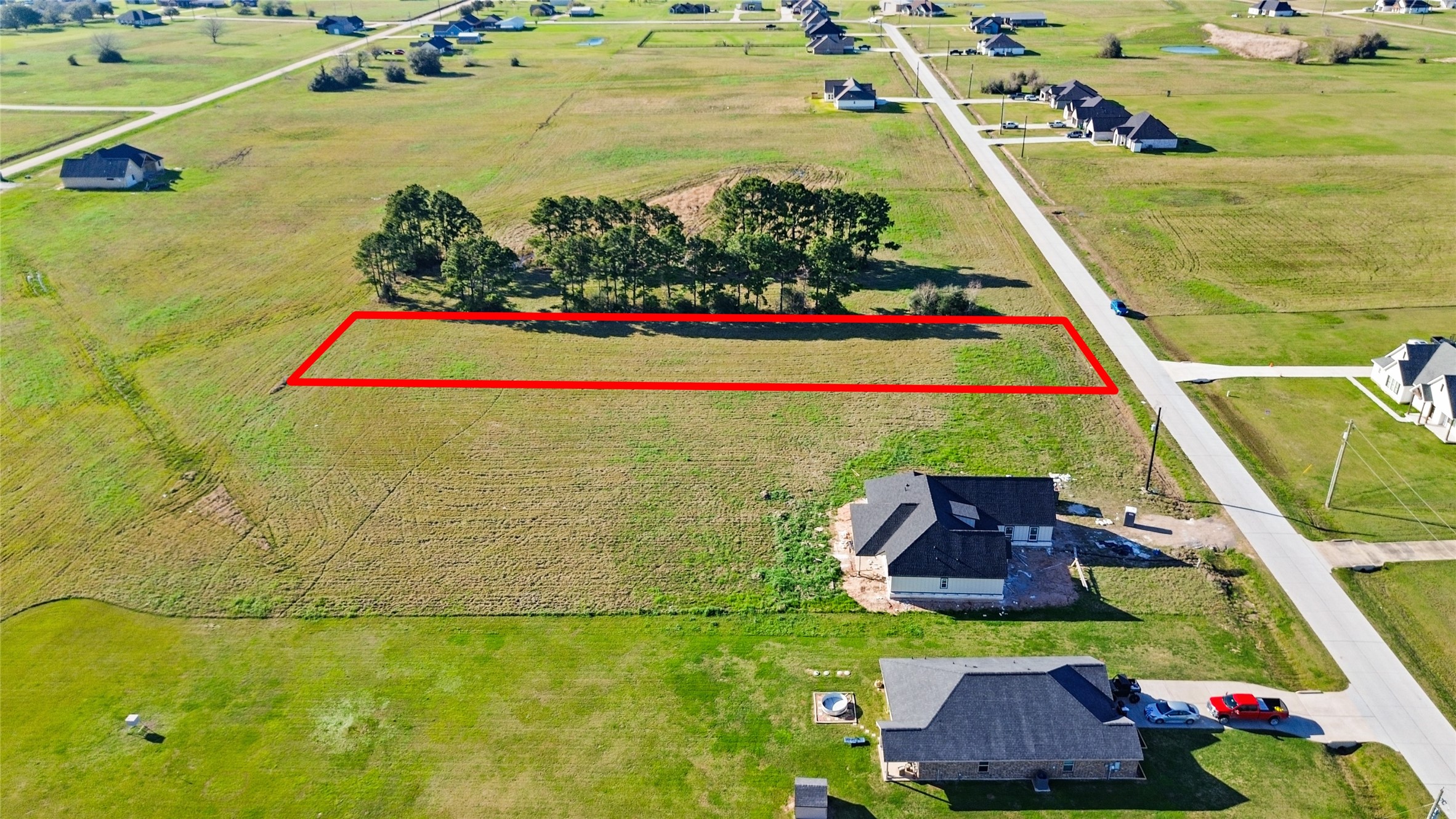 577 Longhorn Trail Angleton, TX 77515 - Photo 2 of 10 a view of swimming pool with a garden and seating area