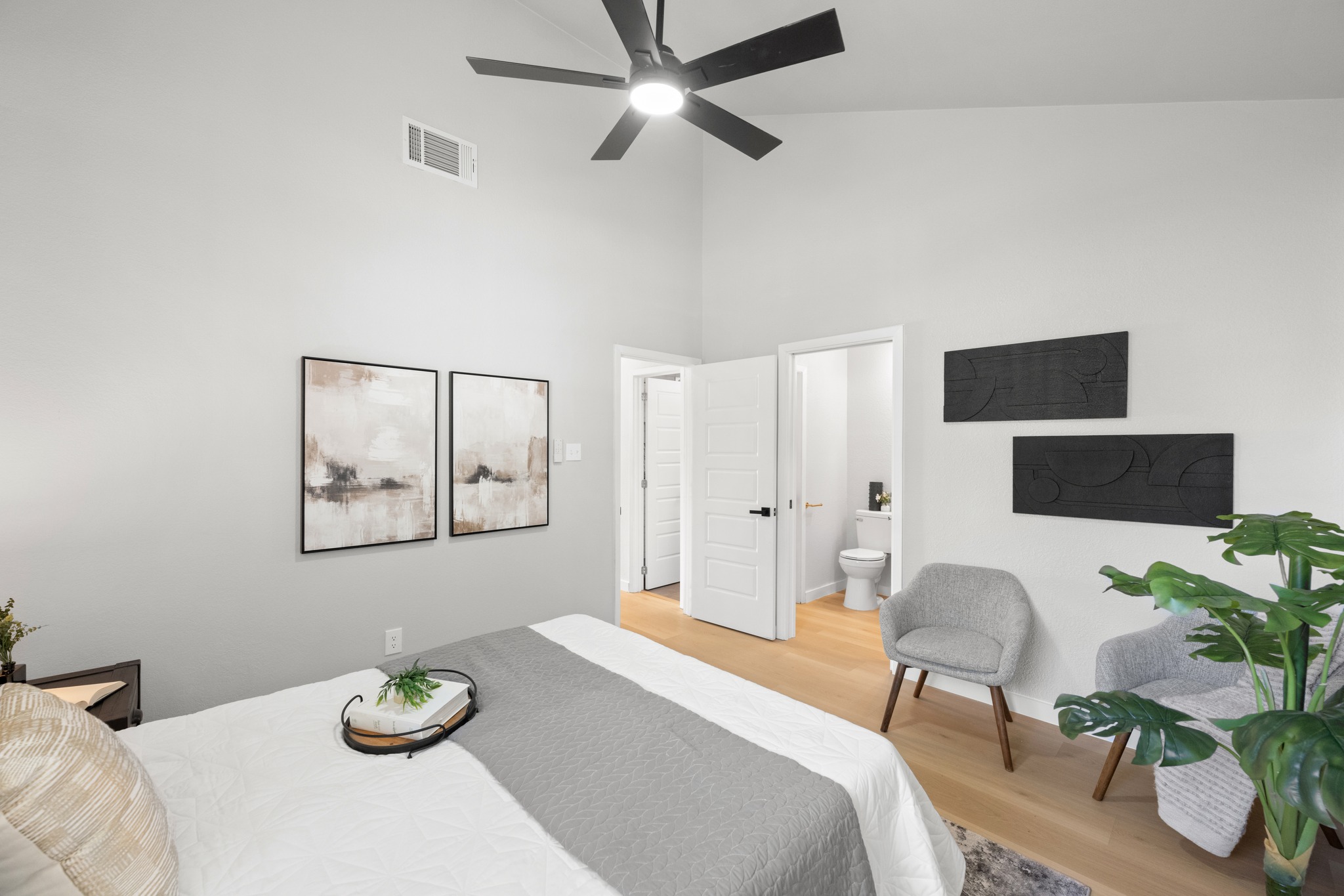 6501 Brush Country Road, Unit 120 Austin, TX 78749 - Photo 13 of 26 Spacious primary suite featuring a private half bath, oversized walk-in closet, and direct access to the full bath
