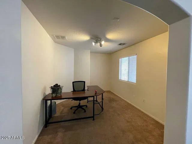 a room with furniture and windows