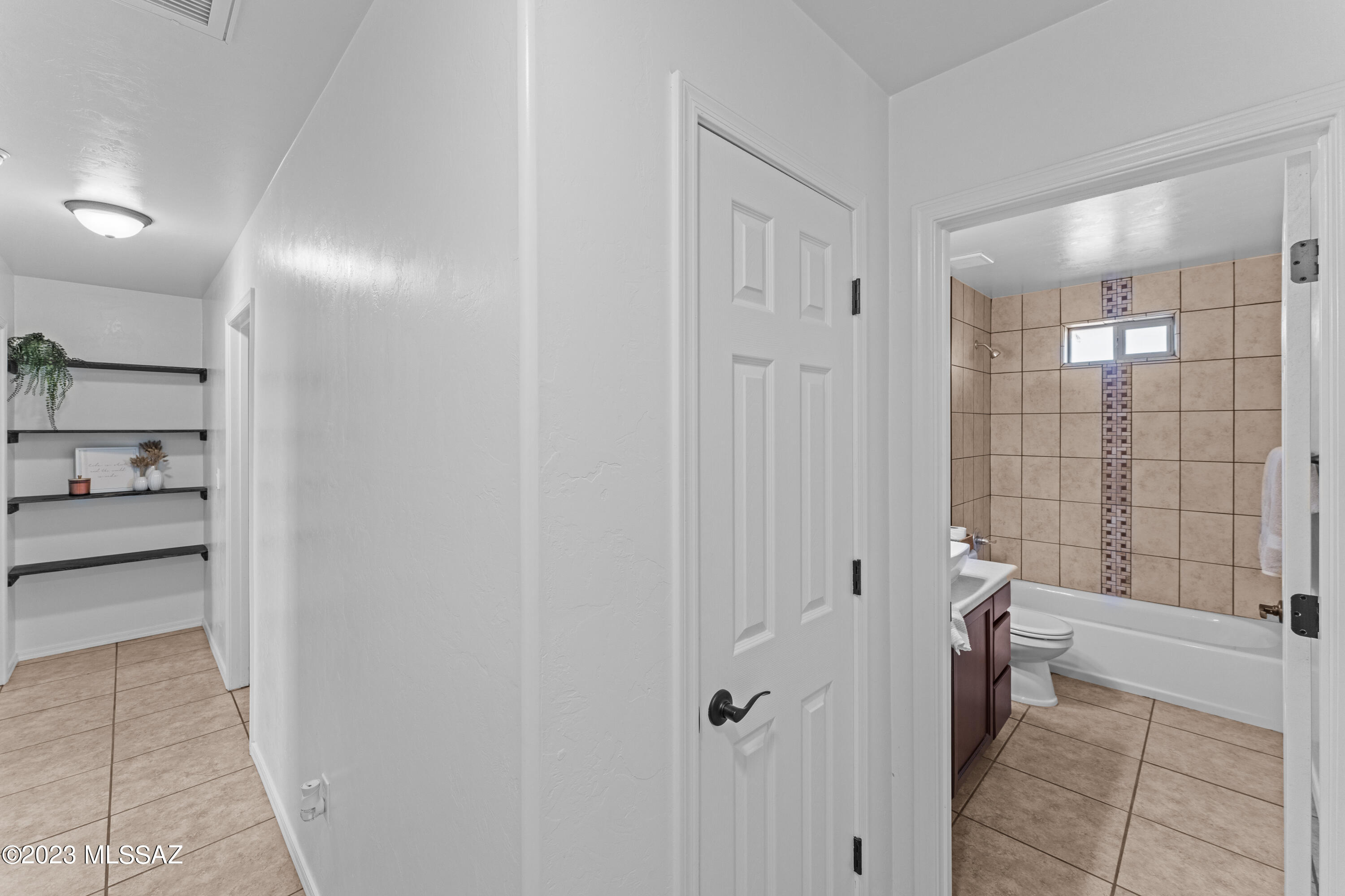 1615 Tonina Court Rio Rico, AZ 85648 - Photo 15 of 28 a bathroom with a shower and a toilet