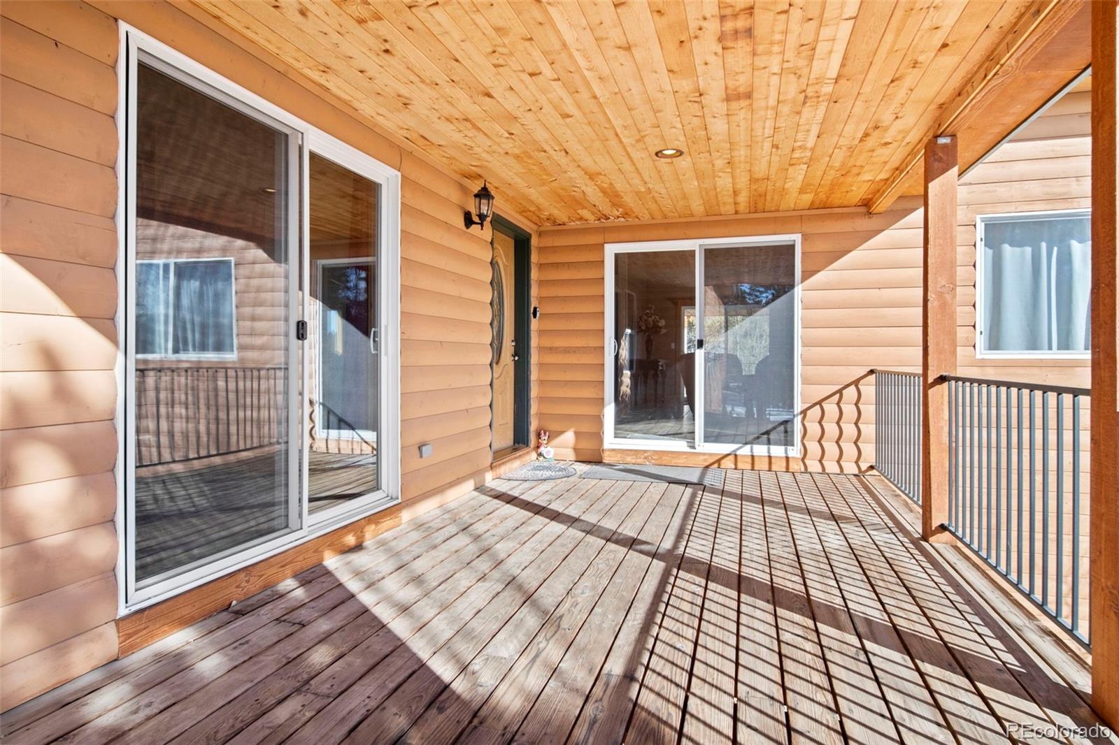 412 Evergreen Road Black Hawk, CO 80422 - Photo 5 of 48 a porch with seating space